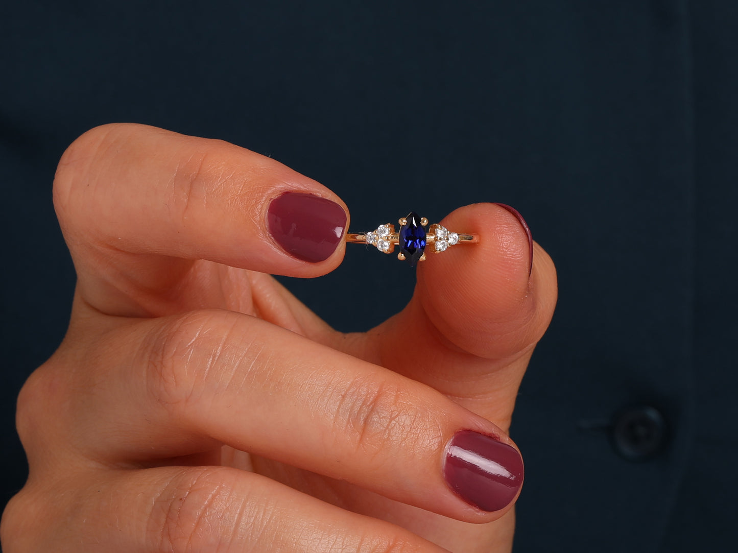 EMERALD MARQUISE CLUSTER RING IN GOLD