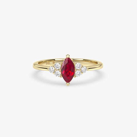 RUBY MARQUISE RING WITH ROUND DIAMONDS IN GOLD
