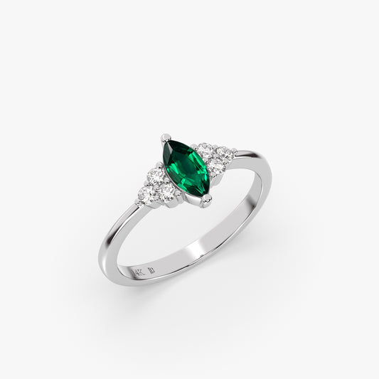 EMERALD MARQUISE RING WITH ROUND DIAMONDS IN GOLD